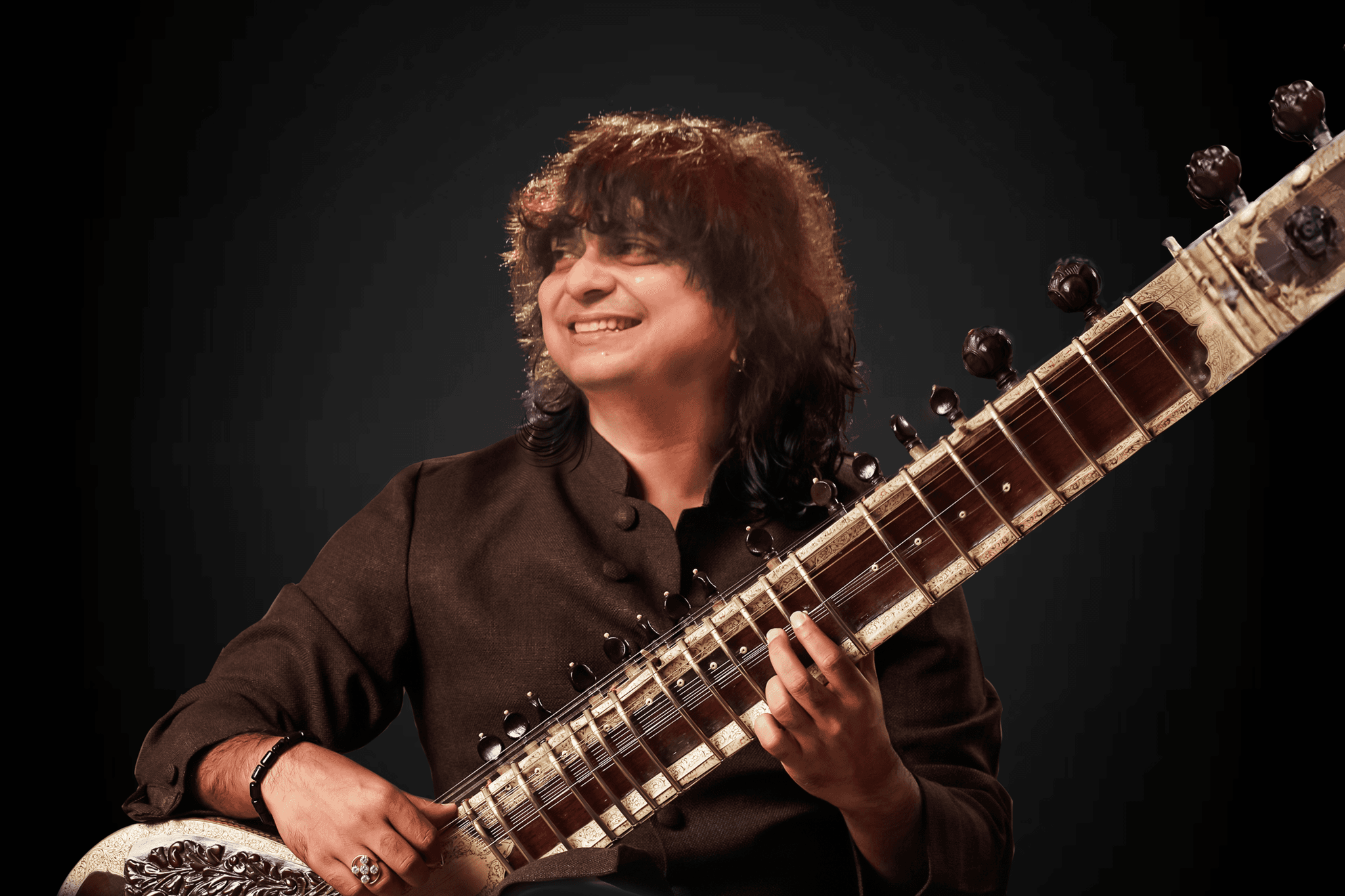 Cover for Niladri Kumaar: The Space Between the Notes, Honoring Zakir Hussain